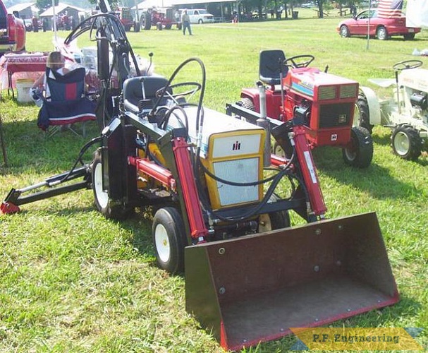 Mark R.'s cub cadet 125 front end loader / micro hoe taking a rest | Cub Cadet 125 garden tractor loader_1