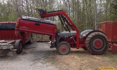 Ford 9N loader lifting pickup bed