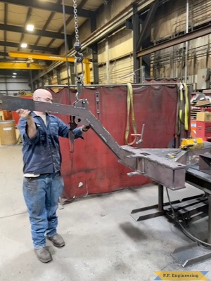 Brandon K. building his tow behind Micro Hoe main frame